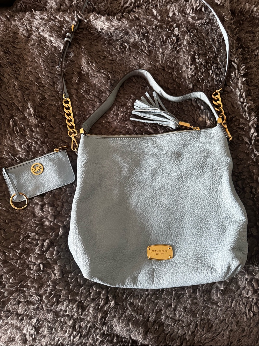 2pc Michael Kors Pebbled Leather Bag w/matching coin purse in light blue.